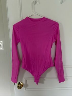 Skims long sleeve body suit
